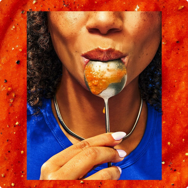 Close-up of a single green leaf against a white background.