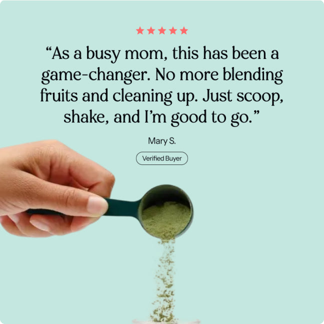 Close-up of a single green leaf against a white background.